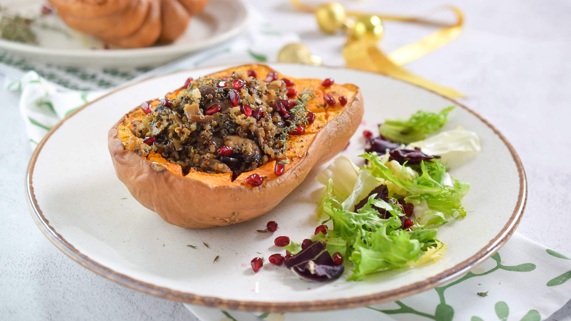 Pumpkin stuffed with quinoa and champignon mushrooms